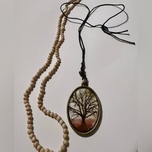 Vintage brass pendant with bare tree on cord